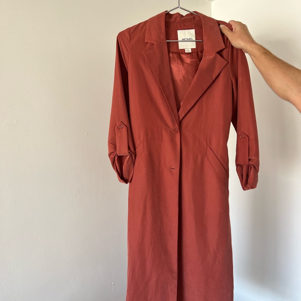Salmon color coat. Sustainable design from Sweden.